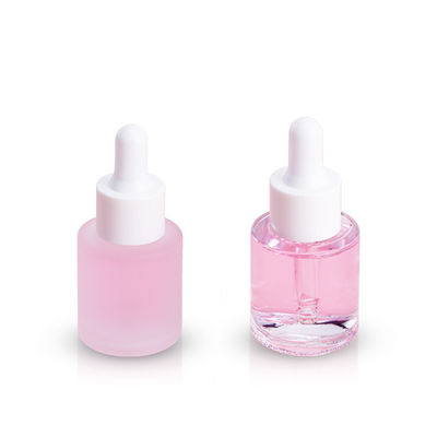 China Simple Round Glass Foundation Bottle with Free Samples Transparent Glossy Finish